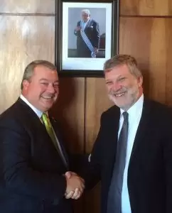Canfield, left, talks with Roberto Kreimerman, Uruguay's Minister of Industry, Energy and Mining, during a trade mission to South America, June 5, 2014.