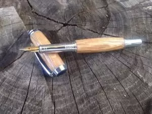 Joel Lockridge handcrafts pens from bourbon barrels.