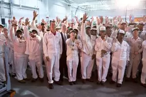 Honda workers celebrate the opening of the new automated engine line during a ceremony at the Alabama plant.