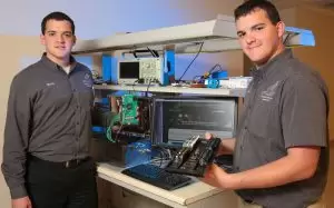 Twins Mark and Eric Becnel with RadioBro satellite radios