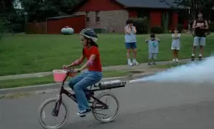 Tim Pickens' daughter rides rocket bike