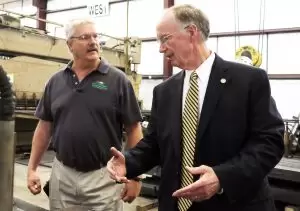 Alabama Gov. Robert Bentley poses for photos and greets workers at Hornsby Steel, Inc., in Cleveland, Alabama, Monday, Sept. 28, 2015, while touring the small business that bends and rolls steel into intricate shapes, often used in architectural projects. The company was one of eight Alabama companies presented the Governor's Trade Excellence Awards in March 2014. (Governor's Office, Jamie Martin)