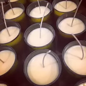 Green Bottle Candle Co. uses hand-poured soy and recycled wine bottles.