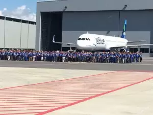 Airbus' Alabama workforce stands with 'BluesMobile.'