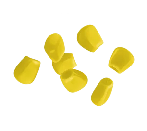 Several kernels of corn that appear to be falling.