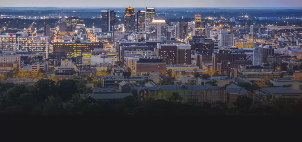 The Birmingham skyline at dusk.